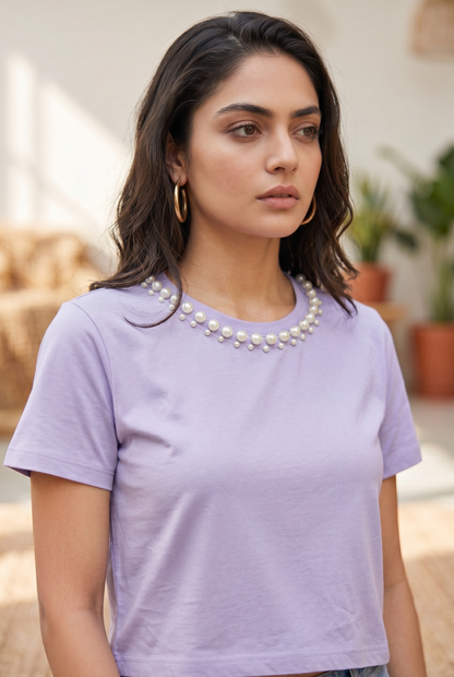 Front angle of women’s lavender pearl embellished cotton crop top.
